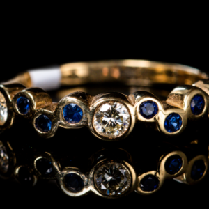 Bubbles Diamond and Blue Sapphire Half-Eternity Ring,